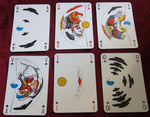 playing cards, vintage playing cards, French playing cards, rare playing cards, art playing cards, novelty playing cards, optical illusion cards, anamorphic art, Pino Zac, Giuseppe Zaccaria, Grimaud France Cartes, 1983 deck, collector cards, erotic playing cards, surrealist cards, anamorphoses deck, rare French deck, political cartoon art, vintage card game, retro card deck, rare poker cards